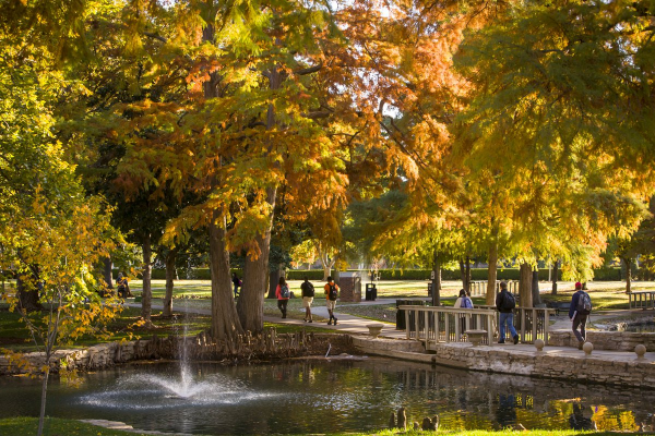 students in the fall near Theta Pond