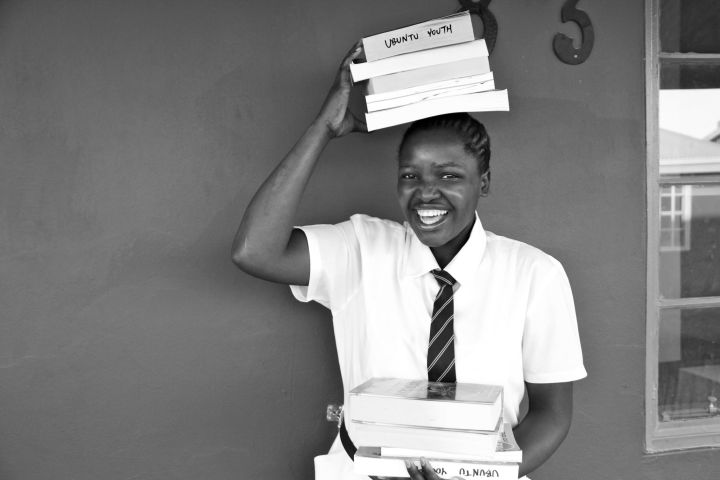 Ubuntu Youth Student with Textbooks
